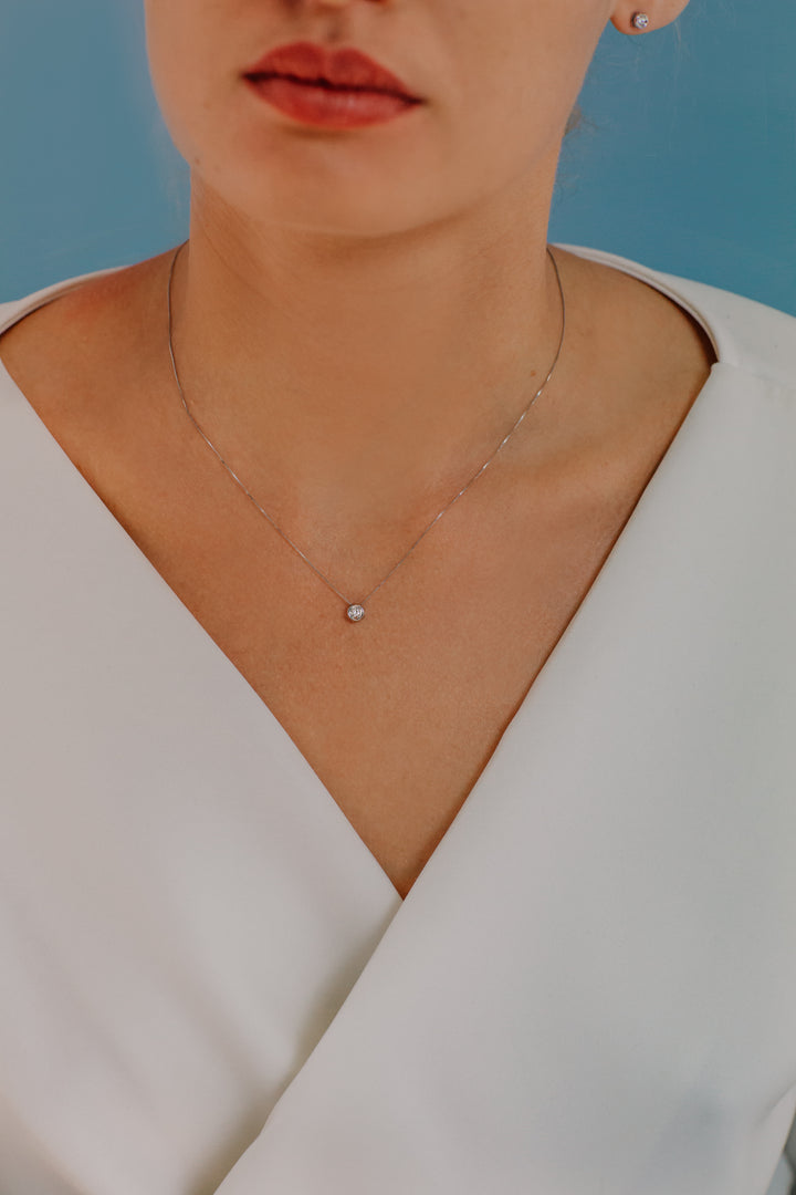 Comete Collana Punto luce tondo in Oro e Diamante GLB1420