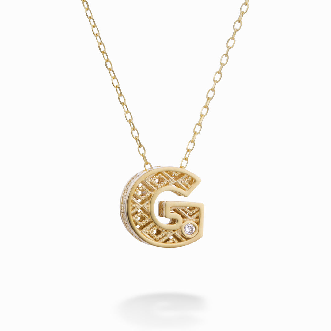 Nihama cl 18k bogstav g gul guld diam. ct.0,01 NDLETGO1