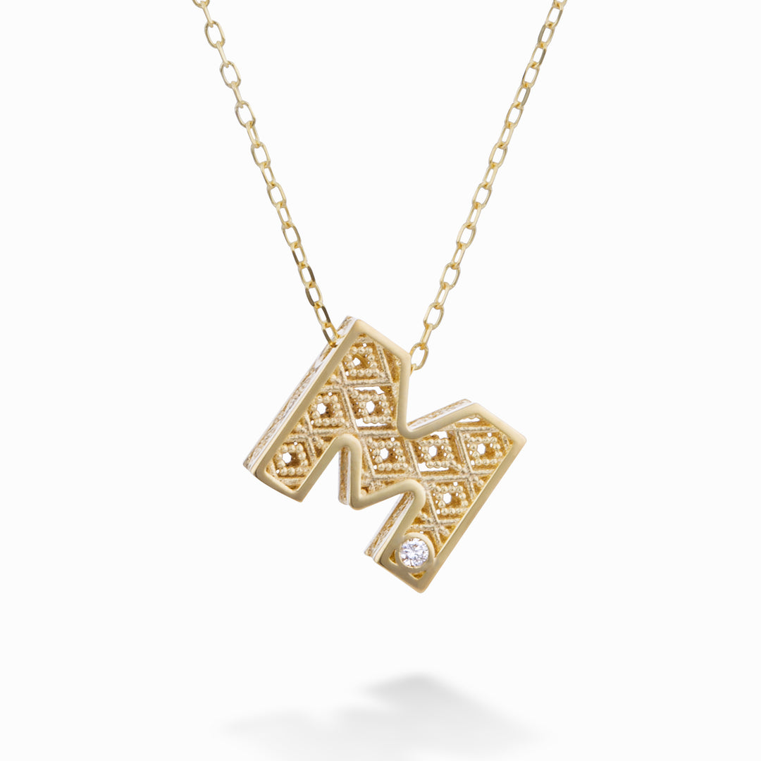 Mikiko cl 18k bogstav m gul guld diam. ct.0.01 MDLETMO1