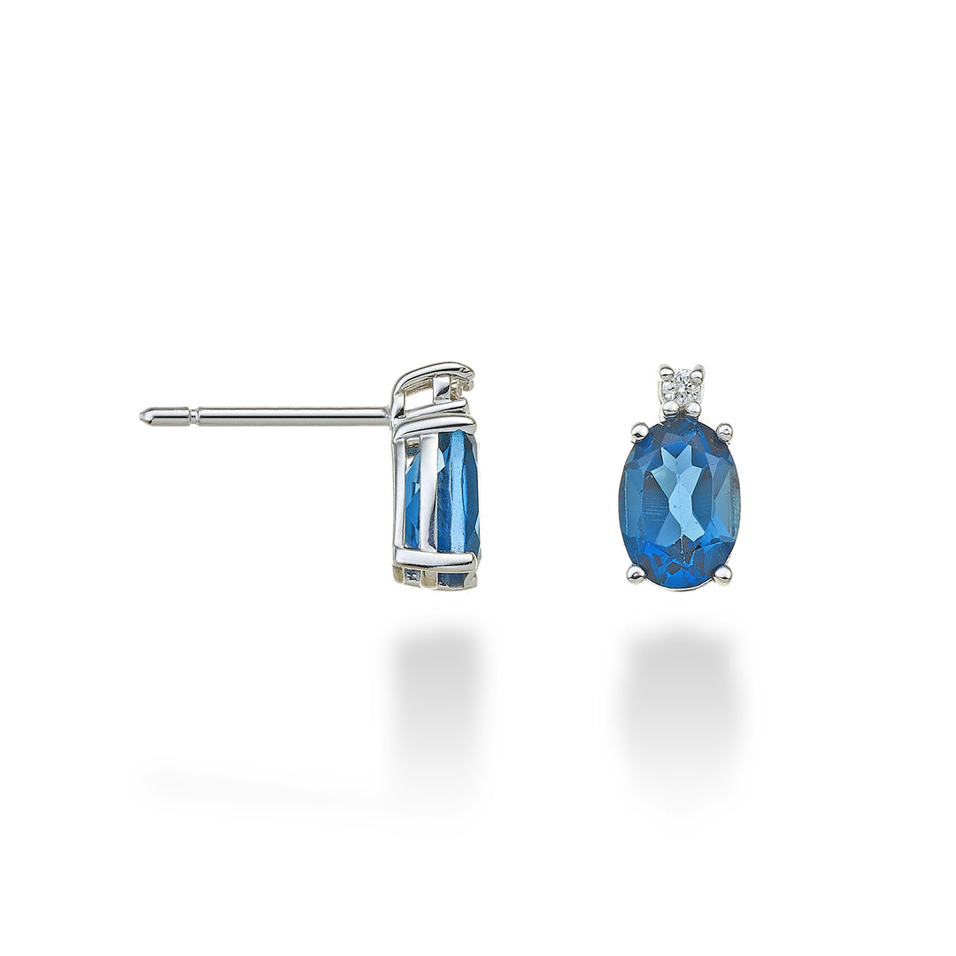 Nihama or 18k oval London blue topaz 7x5 ct.2.00 diam. 0.03 ct NO5024O4TPBL