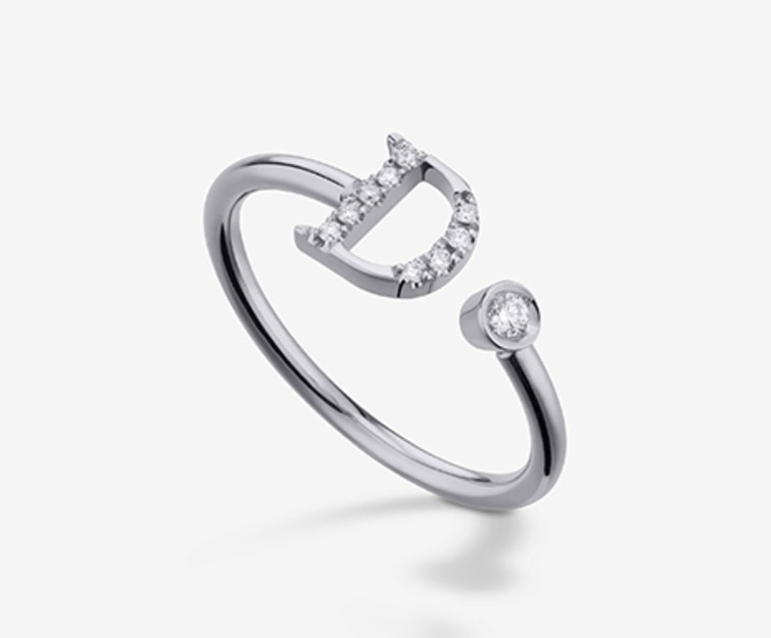 Golay une lettre d 9k grand diamètre en or blanc. ct.0,08 GAFDD2R4