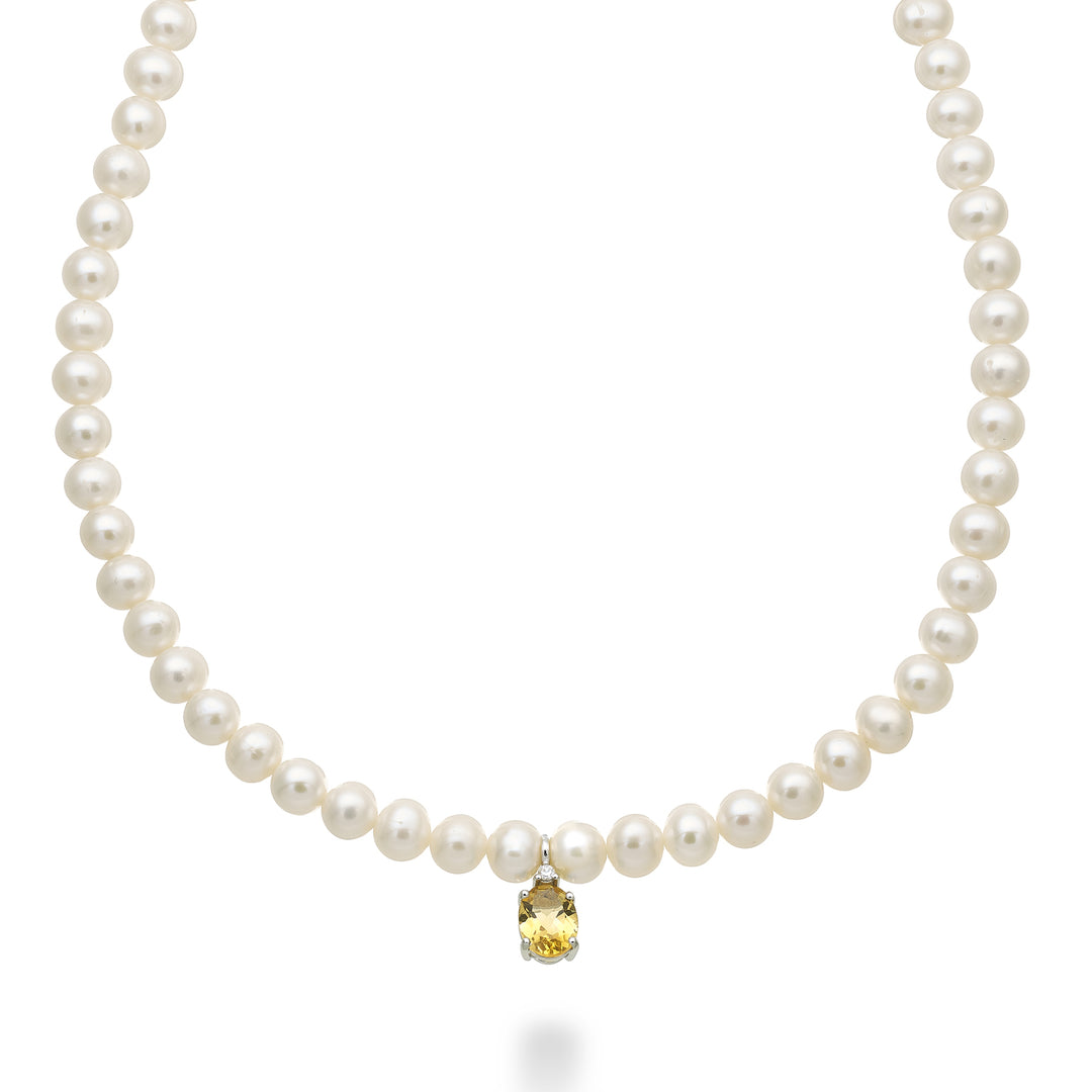Nihama cl 18k fw 5,5/6 citrin oval 6x8 ct.1,10 diam. 0,02 ct inel arc NC1576O4CITR55