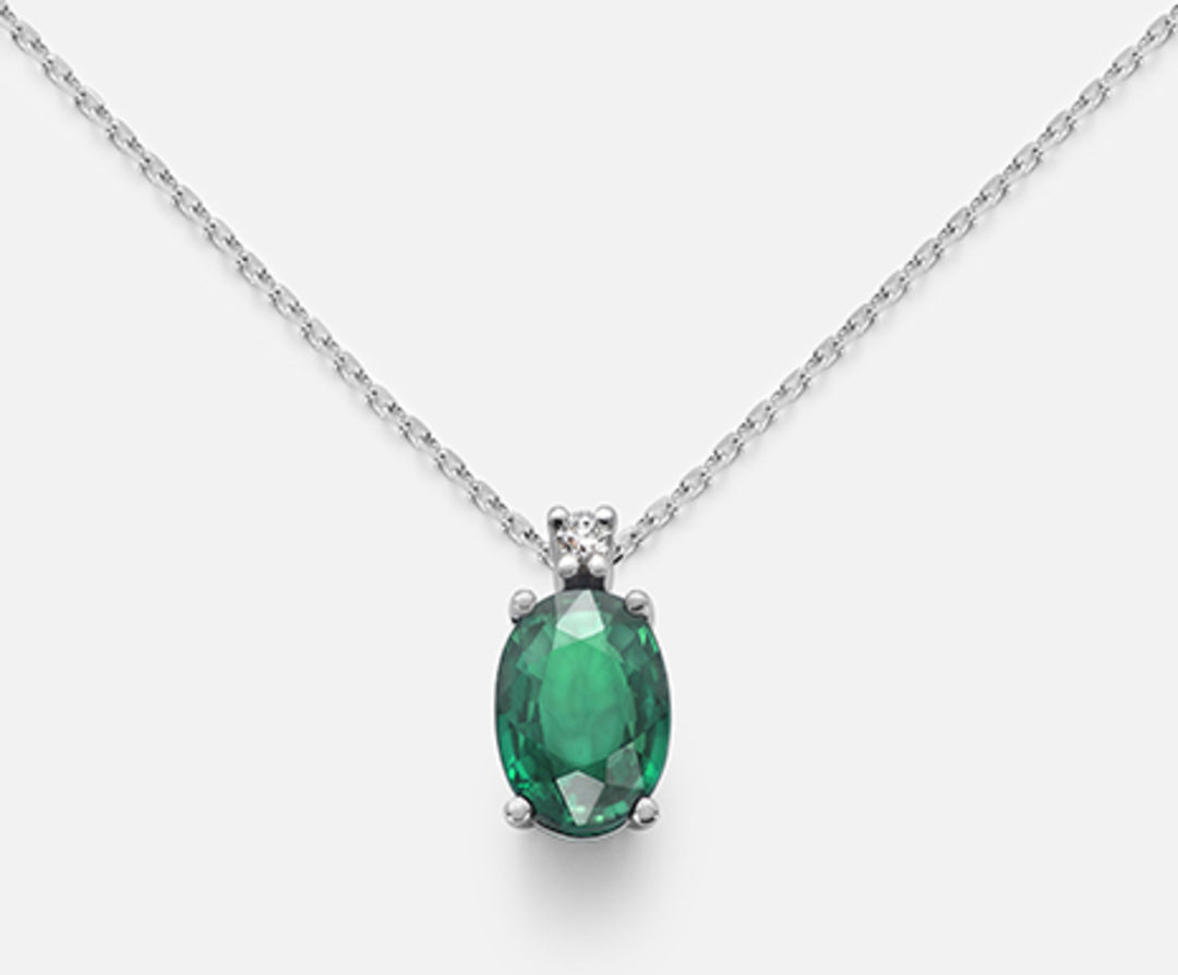 Mikiko cl 9k smaragd n. ovális 7x5 ct.0,80 átm. ct.0,015 MD5035R4SMN080
