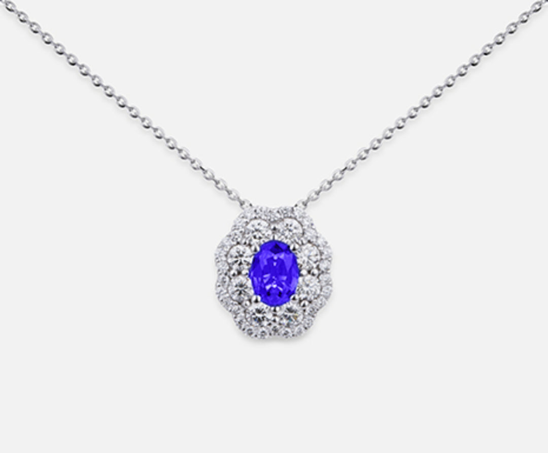 Mikiko cl 18k tanzanite n. oval 6x4 ct.0.38 dia ct.0.63 MD5057O4TZN