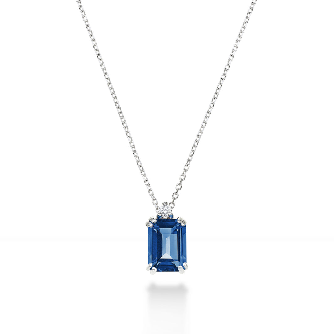 Nihama cl 18k osmihranný londýnský modrý topaz 7x5 ct.1,20 pr. ct.0,025 NPCL090DITPBL2O4
