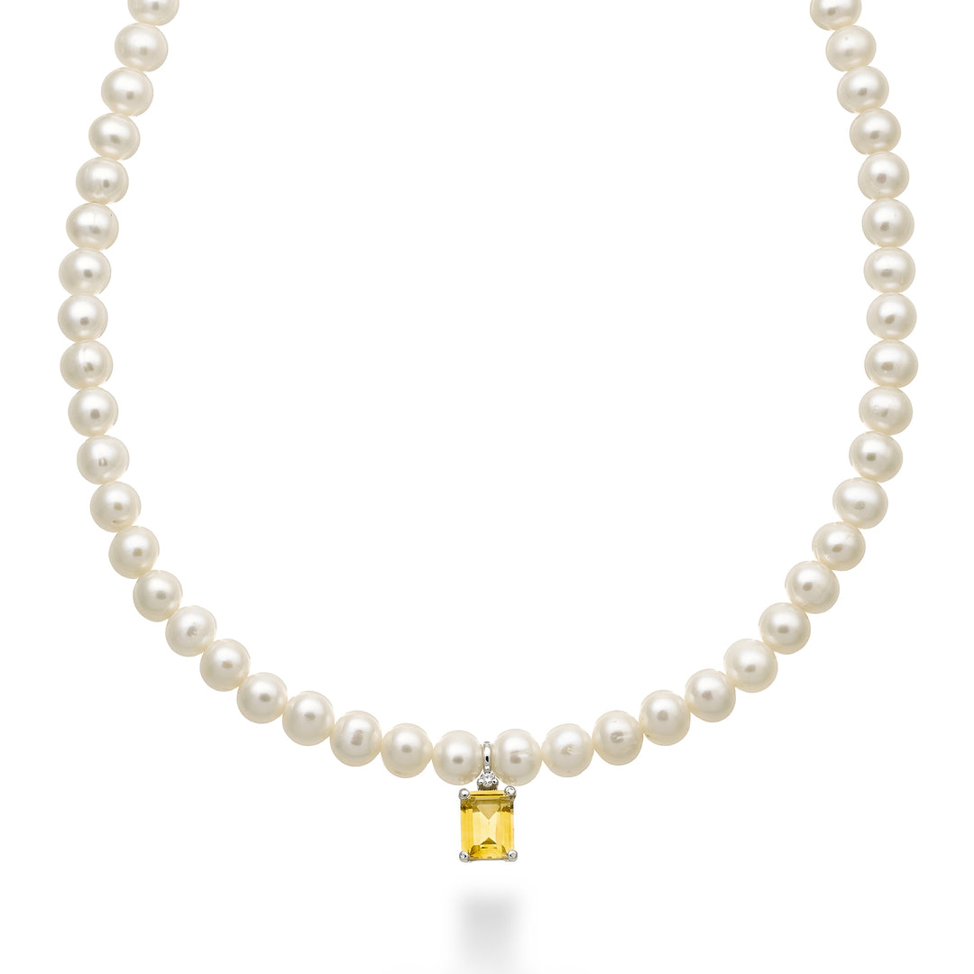 Nihama cl 18k fw 5,5/6 citrin oct. 6x8 ct.1,30 diam. 0,02 ct inel arc NC1575O4CITR55