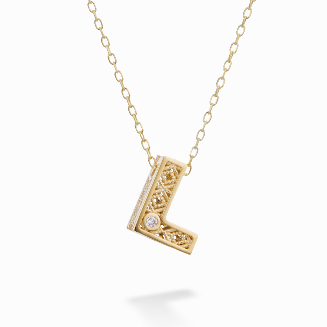 Mikiko cl 18k γράμμα l κίτρινο χρυσό διάμ. ct.0,01 MDLETLO1