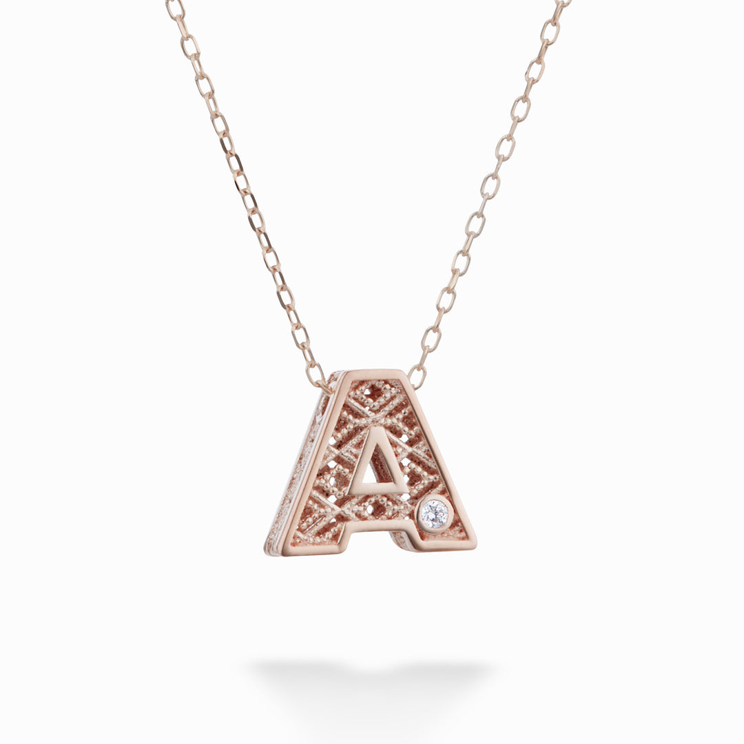 Nihama cl letra em ouro rosa 18k diam. ct.0,01 NDLETAO3