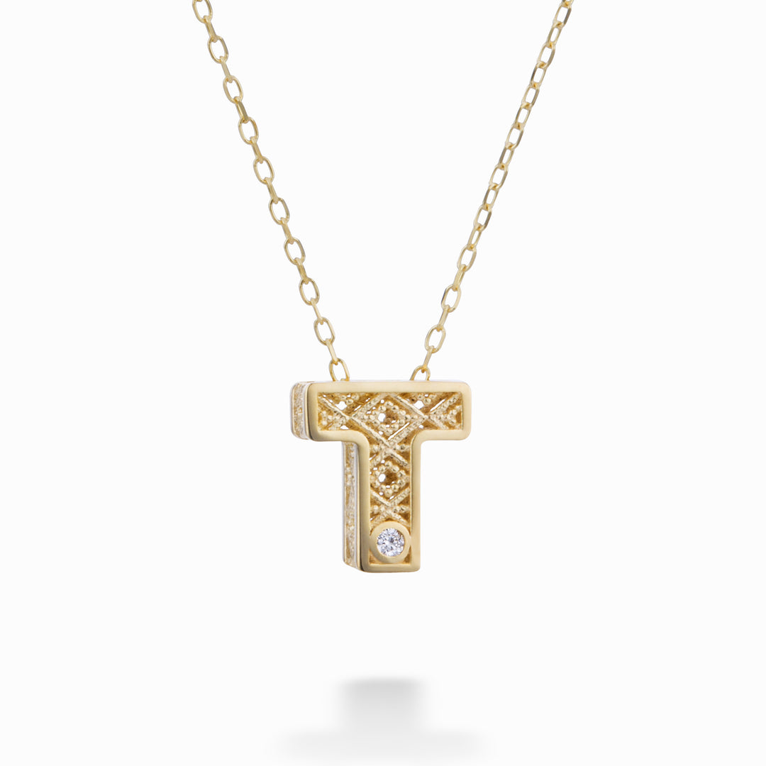 Mikiko cl 18k kirjain t keltakulta halm. ct.0,01 MDLETTO1