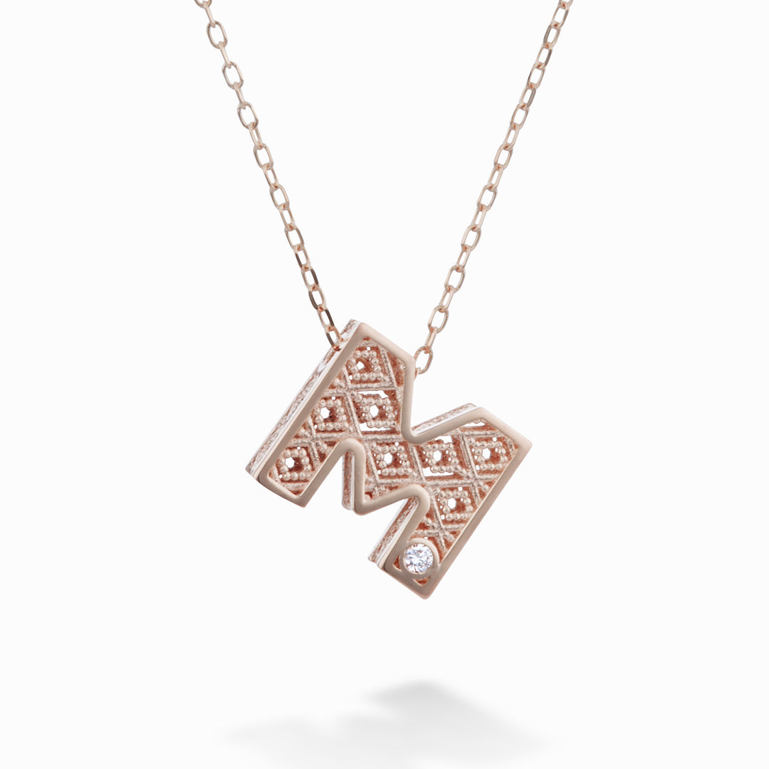 Nihama cl 18k letter m roségoud diam. ct.0,01 NDLETMO3