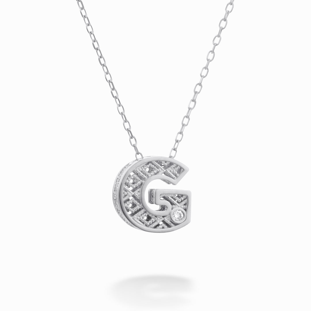 Nihama cl 18k γράμμα g λευκόχρυσο διάμ. ct.0,01 NDLETGO4