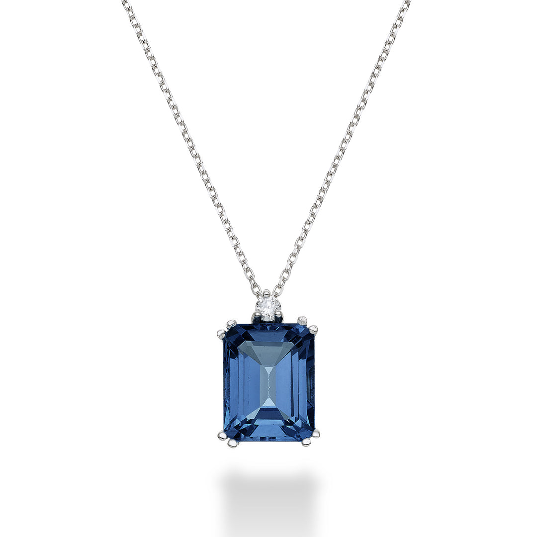 Mikiko cl 18k ottekantet London blå topas 7x9 ct.2.65 diam. ct.0,04 MPCL090DITPBL4O4
