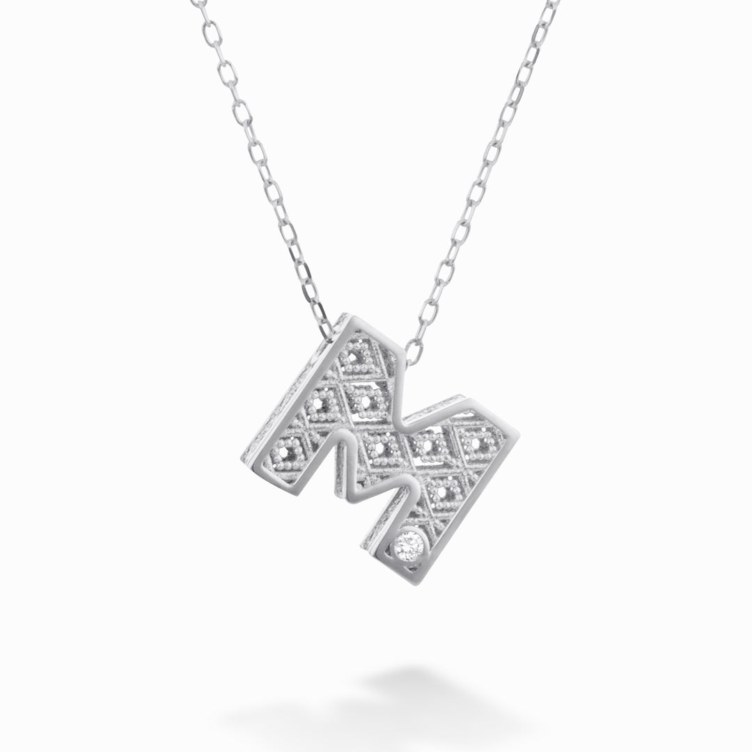 Mikiko cl 18k písmeno m bílé zlato pr. ct.0.01 MDLETMO4