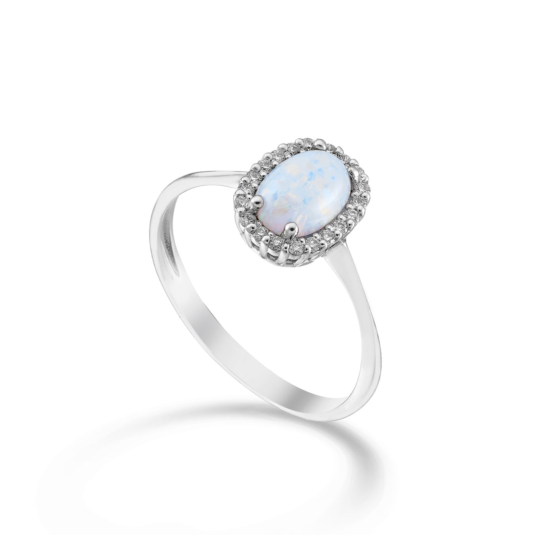 Nihama en 18k opal cabochon oval 7x5, med diamantkontur NA5207O4OP