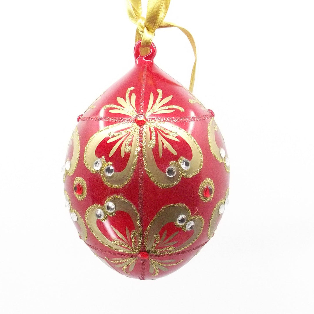 Décoration Oeuf Fabergé en verre rouge avec décoration en or pur et strass A/557233 - Gioielleria Capodagli