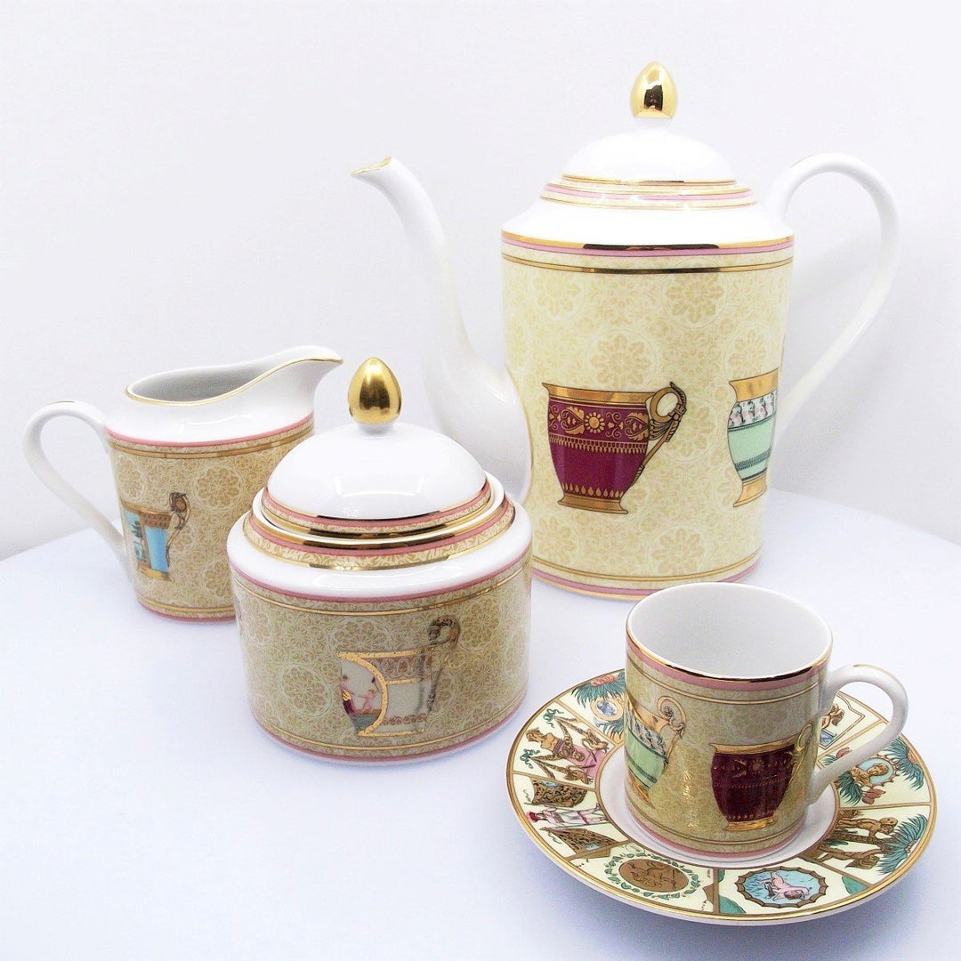 Service à café Gucci 15 pièces 12 tasses cafetière pot à lait sucrier porcelaine finition or A/0344 - Gioielleria Capodagli