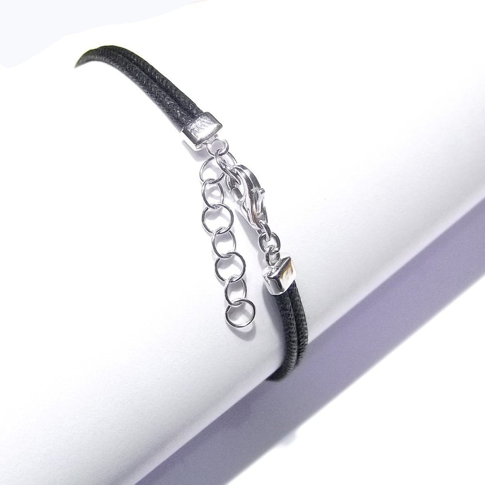 Linsen aus Leder und Armband aus 18-karätigem Weißgold mit Diamanten von 0,516 ct, Farbe G, Reinheit VS 0059BR* – Gioielleria Capodagli